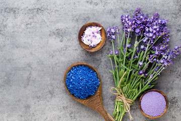 Essential lavender salt with flowers top view.