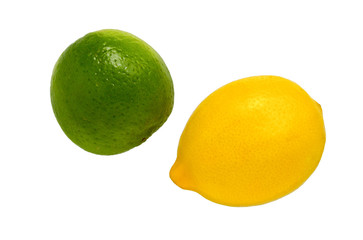 Lime and lemon isolated on the white. Ripe green lime and lemon