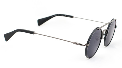 Sun glasses with round blue glasses on a white background