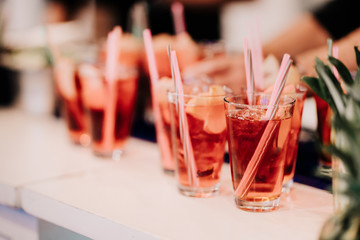 refreshment alcoholic cocktail drink at bar or pub. Gin, vodka and lime cocktail with apple cider and ice served cold by bartender