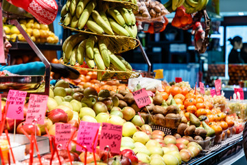 Fototapeta na wymiar Shop at the market with fruit. A lot of different fruits.
