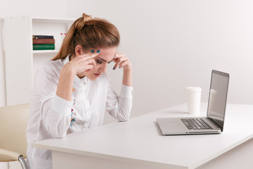 Stressedbusinesswoman having headache at work concept, frustrated dizzy chinese woman touching...