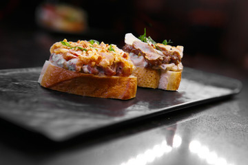 sandwiches on a black background.