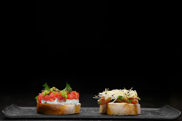 sandwiches on a black background.