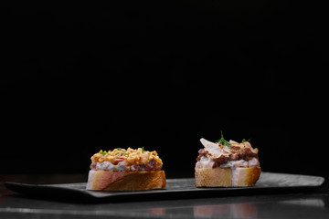 sandwiches on a black background.