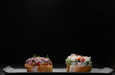 sandwiches on a black background.