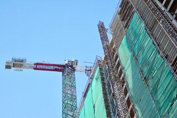 Crane attached to building