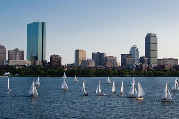 The Boston skyline along the Charles River one a beautiful summer day.