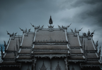 White temple roof in Chiang Rai (Thailand)