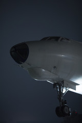 Close-up of old airplane over background of night sky.