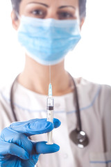 Doctor holding a syringe with an injection solution on white background