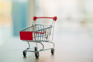 Online shopping through a shopping cart. - Image