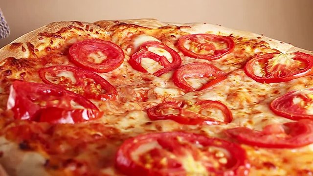 Home made pizza food closeup texture pattern seamless looping rotating video footage hd resolution.