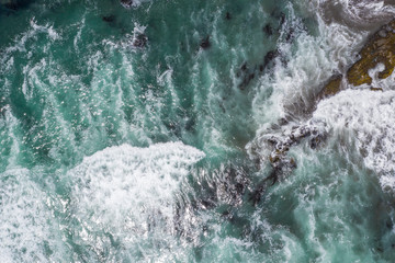 Waves approaching the coast at Las Brisas beach turquoise waters creating impressive forms in order...