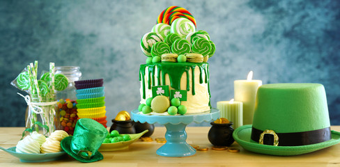 St Patrick's Day theme candyland novelty drip cake and party table.