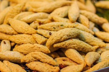 Fried fish balls for sale in the night market at Bangkok, Thailand.