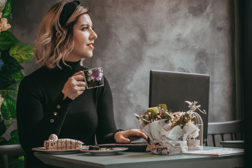 Woman typing on laptop