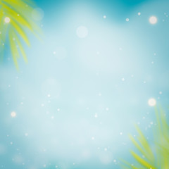 Fototapeta na wymiar Summer background tropical palm leaves on nature blue sky and sea background
