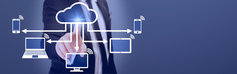 suit businessman touching on cloud icon on virtual screen over dark background