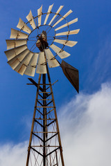 Windmill against a blue sky background