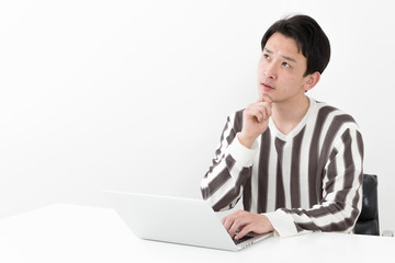 portrait of casual asian man on white background