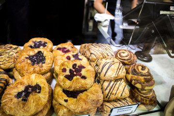 pastries and bread on bakery stall