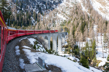 Bernina Express is passing the viaduct - Switzerland