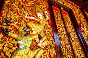 Wooden Carving of The Ramayana Epic on Temple Wall - Samut Songkhram, Thailand