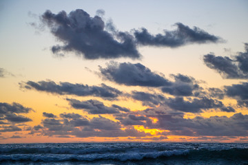Naklejka na ściany i meble Beautiful orange sunset over Pacific Ocean from Manhattan Beach, California