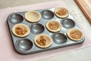 Pierogi preparation in baking tray
