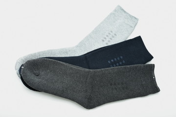 three pairs of men's socks