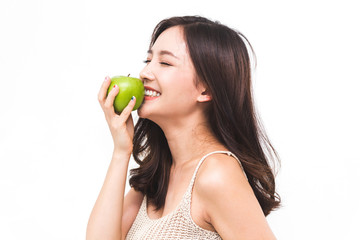 Woman holding and eating fresh green apple on white background.dieting concept.healthy lifestyle