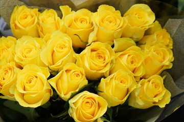 Fresh yellow roses bouquet flower background 