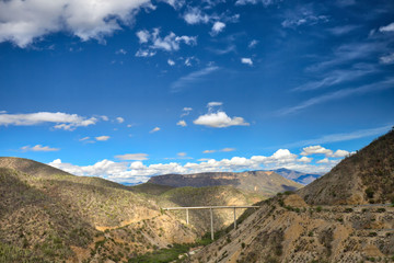 Road from Oaxaca to Mexico City through scenic mountain ranges and valleys