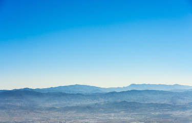 Summer of Thailand with landscape mountains and blue sky natural background.