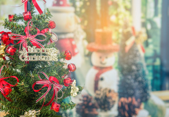 Christmas tree with snowman background