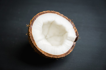 Fresh coconuts on the rustic background. Selective focus. Shallow depth of field.
