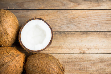 Fresh coconuts on the rustic background. Selective focus. Shallow depth of field.