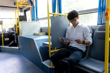 young businessman passenger use time in the bus