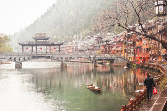 One of the traditional bridges over the Tuojiang River (Tuo Jiang River) in Fenghuang old city (Phoenix Ancient Town),Hunan Province, China.