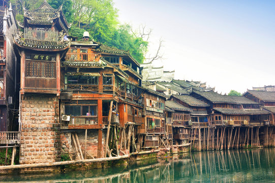 The spectacular landscape of the Diaojiaolou (traditional Chinese gabled wooden houses built on stilts) be preserved  in Fenghuang old city (Phoenix Ancient Town),Hunan Province, China.