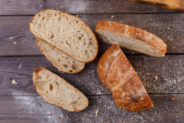 Sliced fresh bread close-up view from above. The concept of healthy food and traditional bakery.