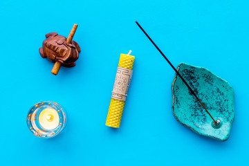 Meditation and eastern spiritual practices concept blue background top view