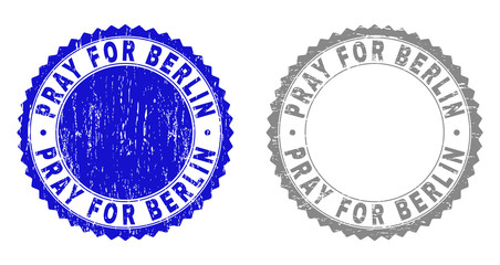 Grunge PRAY FOR BERLIN stamp seals isolated on a white background. Rosette seals with grunge texture in blue and grey colors. Vector rubber stamp imprint of PRAY FOR BERLIN label inside round rosette.