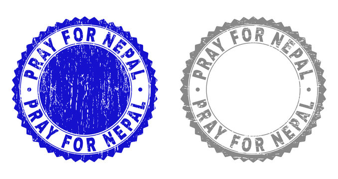 Grunge PRAY FOR NEPAL stamp seals isolated on a white background. Rosette seals with grunge texture in blue and gray colors. Vector rubber stamp imitation of PRAY FOR NEPAL text inside round rosette.