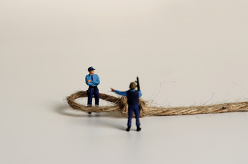 Obraz premium Miniature police and rope.