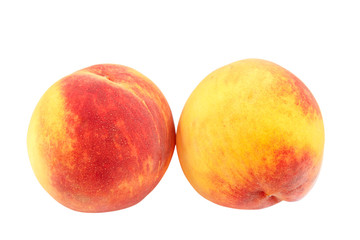 Fresh peach fruits isolated on white background