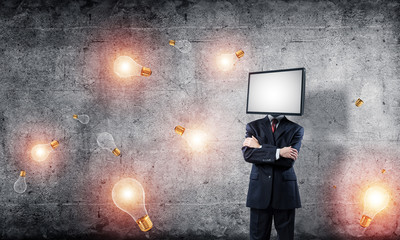 Businessman with TV instead of head.