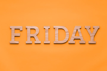 Alphabets day of the week over green background. Letterpress wood type printing blocks