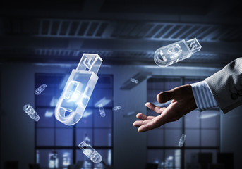 Concept of information storage and security with flash stick icon. Mixed media